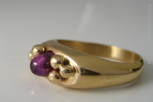 Hand made 18K yellow gold and lab grown alexandrite ring.