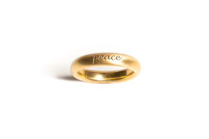 Peace ring in 18 karat yellow gold